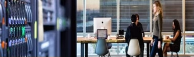 Enterprise data center, operations floor, and corporate skyline