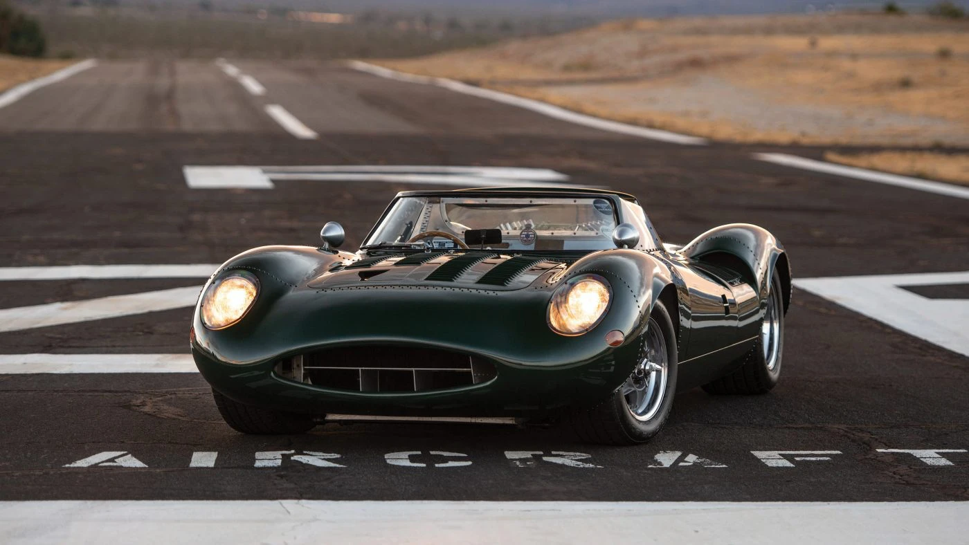 Tempero-built Jaguar XJ13 recreation, British Racing Green, parked nose-on at a former aircraft runway